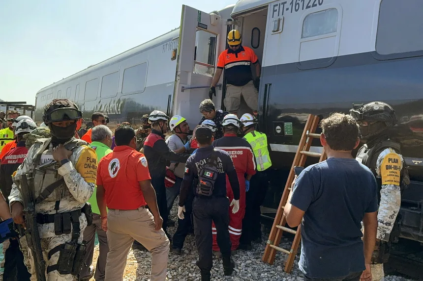 Mexican Army soldiers and Civil Protection members rescue passengers from the Interoceanic train that derailed in the Asuncion Ixtaltepec area on the route to Oaxaca, Mexico, on December 28, 2025. Rusvel Rasgado/AFP/Getty Images